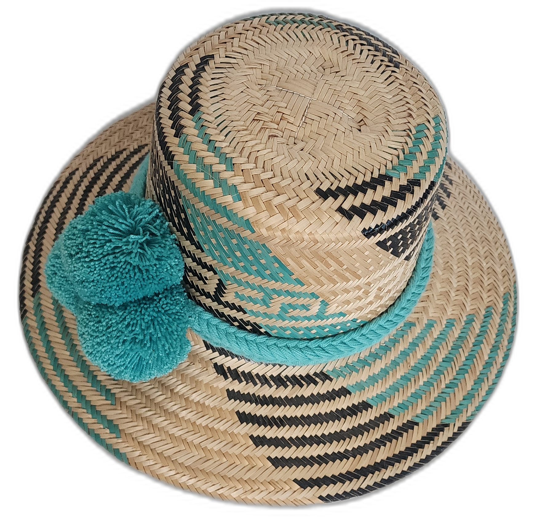 Wayuu hat with vibrant turquoise pompoms and contrasting black geometric designs.
