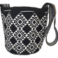 Black and white handmade crochet mochila bag, inspired by Wayuu artisan traditions.