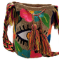 Bohemian-style colorful crochet tote, handmade by Wayuu artisans