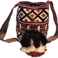 Boho chick Wayuu bag in terracotta, black, and ivory with tribal design.