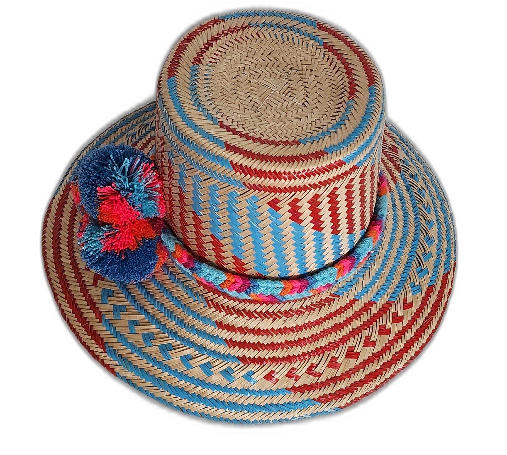 Boho Chick hat featuring woven red-blue pattern and bold pompoms