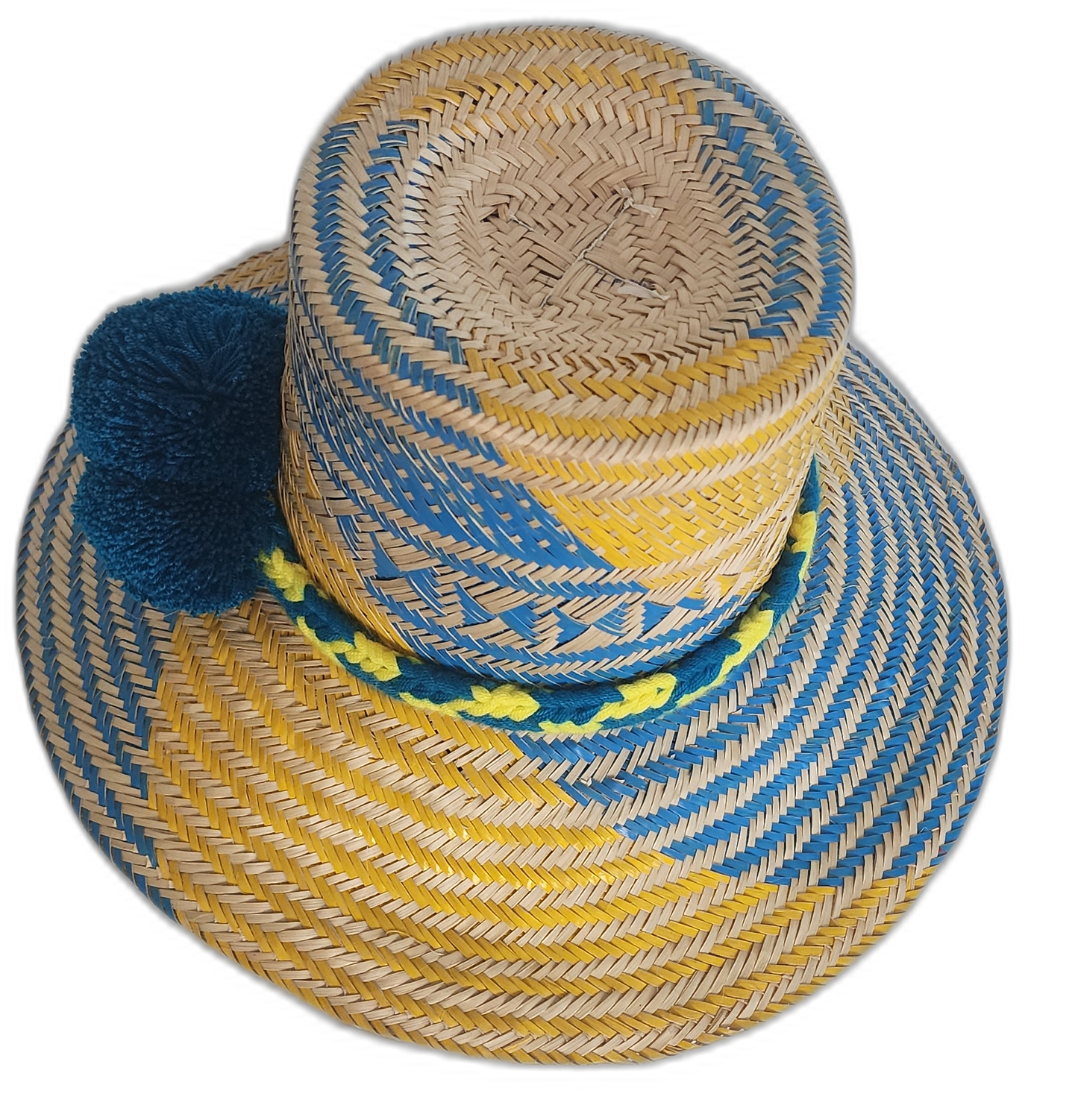 Boho Chick Wayuu Hat with bright tones, deep blue pompoms, and braided band