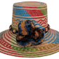 Handmade Wayuu straw hat with colorful weave and earth-toned pompoms