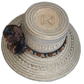 Artisan straw hat with geometric weave and multi-shade pompoms