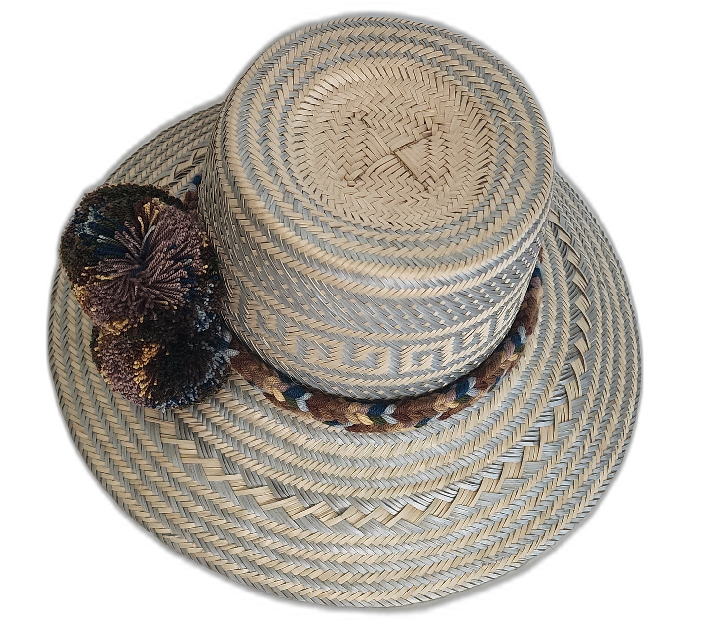 Artisan straw hat with geometric weave and multi-shade pompoms