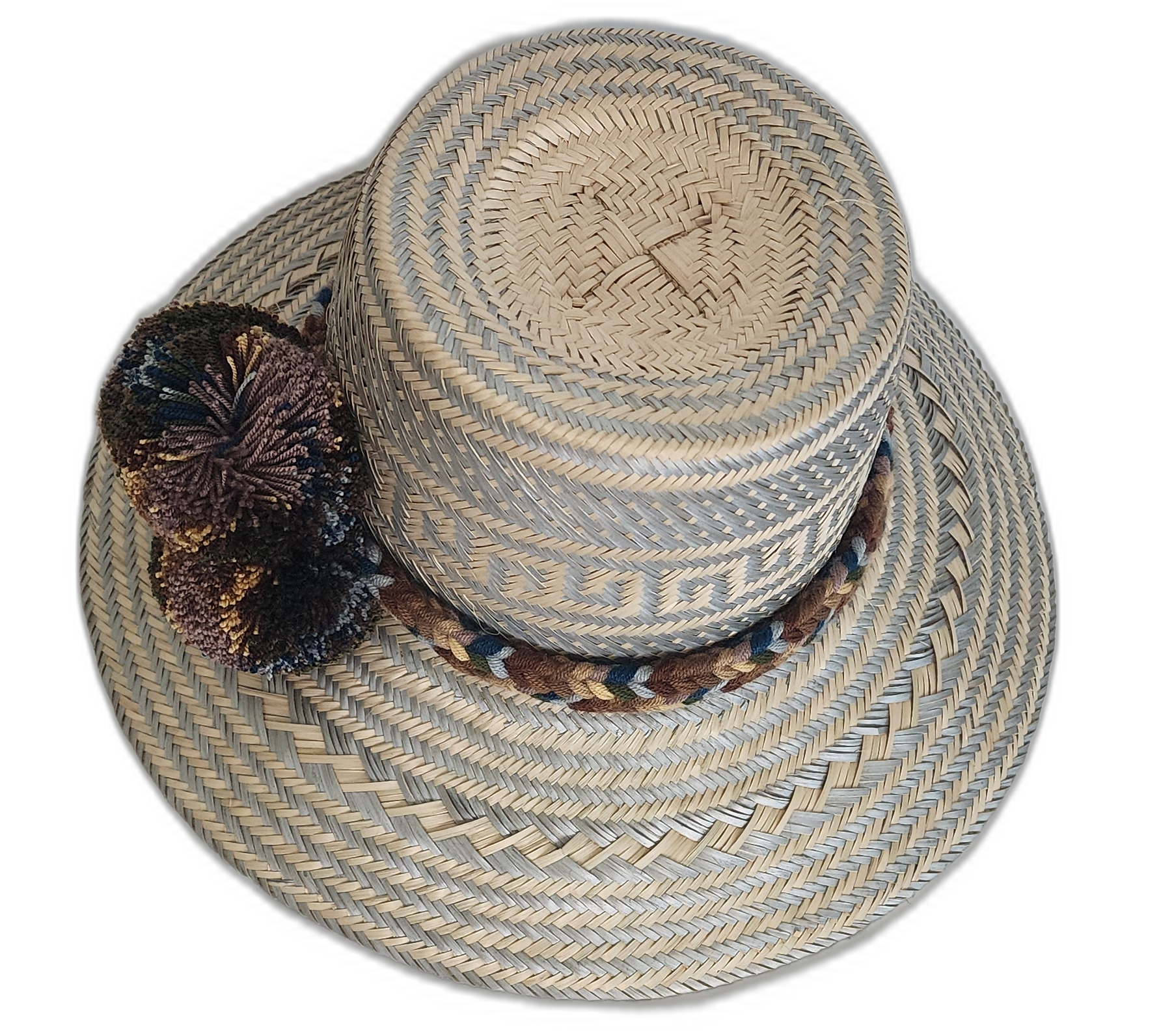 Artisan straw hat with geometric weave and multi-shade pompoms