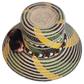 Artisan Wayuu straw hat in green and beige with braided band
