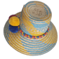 Handmade bohemian straw hat with blue-yellow weaving and three large pompoms symbolizing prosperity.