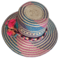 Wayuu chick straw hat with bold purple, blue, and pink tones