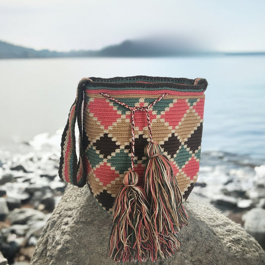 Handmade boho chick Wayuu bag with diamond pattern in red, green, and beige