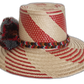 Boho hat with artisan red patterns and pompom accents in grey and rust