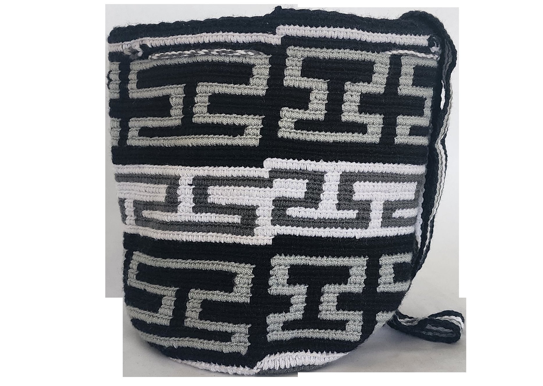 Bottom view Handmade Wayuu bag in black and ivory, showcasing bohemian flair and artisanal detail.