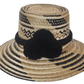 Handcrafted wide brim straw hat, perfect as a boho hat and loved for its warm weather hat flair.
