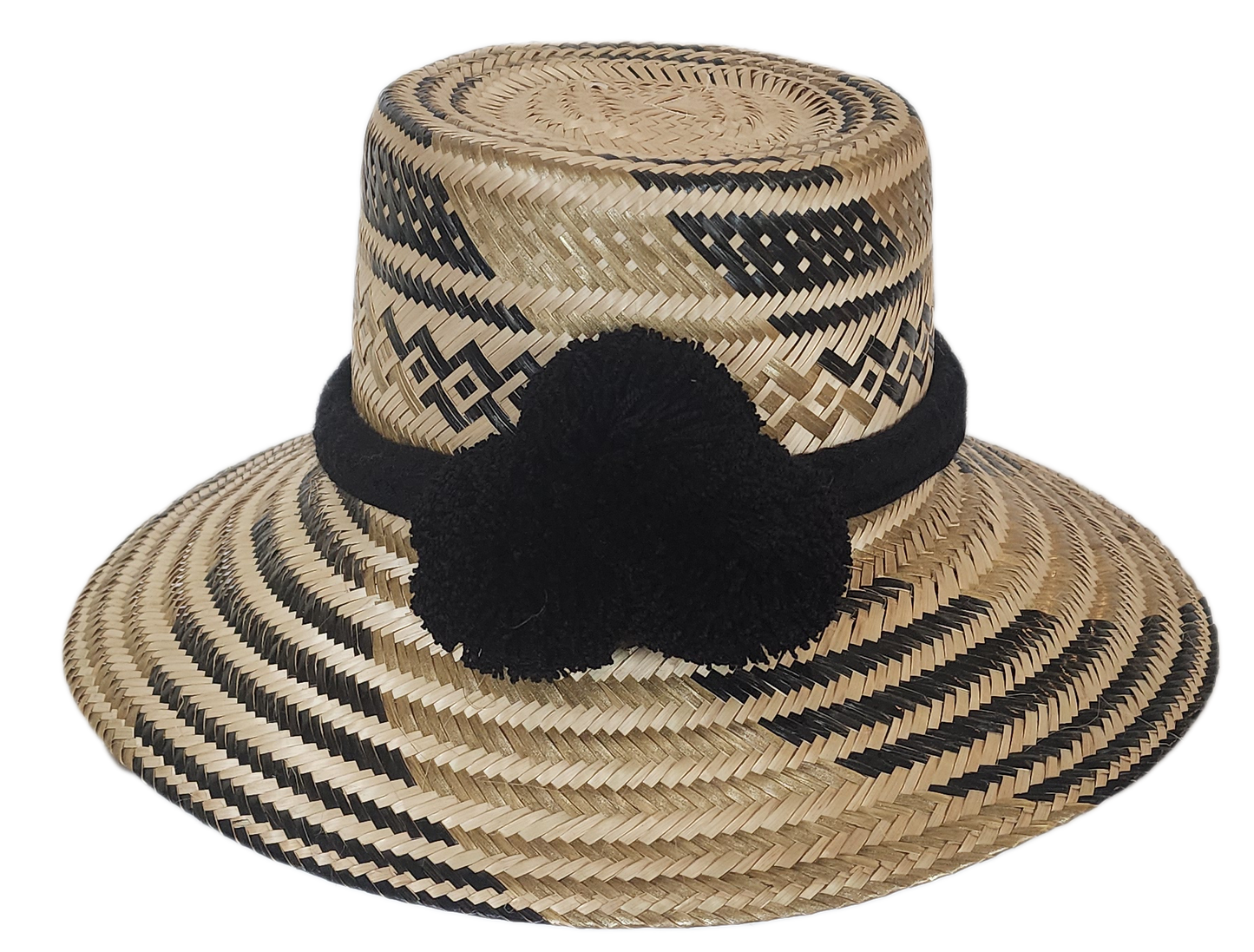 Handcrafted wide brim straw hat, perfect as a boho hat and loved for its warm weather hat flair.
