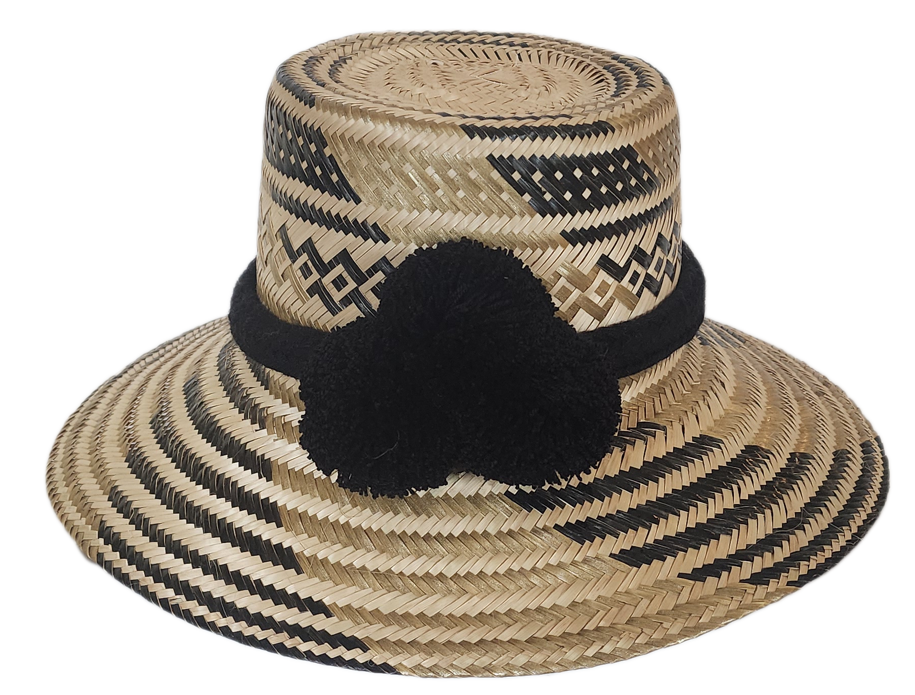 Handcrafted wide brim straw hat, perfect as a boho hat and loved for its warm weather hat flair.
