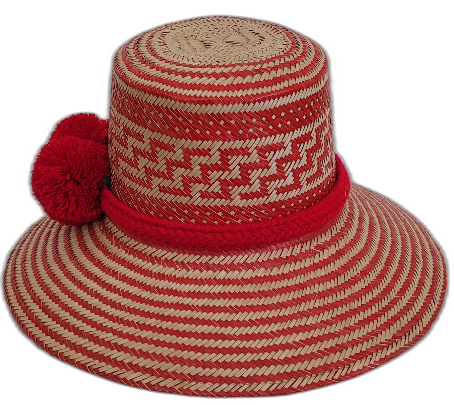 Colorful Boho straw hat, crafted from Iraca palm, featuring red pompoms and bold red-beige weave.

