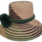 Colorful Boho straw hat, crafted from Iraca palm, featuring deep green pompoms and green-purple beige accents.

