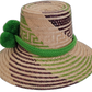 Colorful Boho straw hat, crafted from Iraca palm, featuring green pompoms and green-purple-beige weave.

