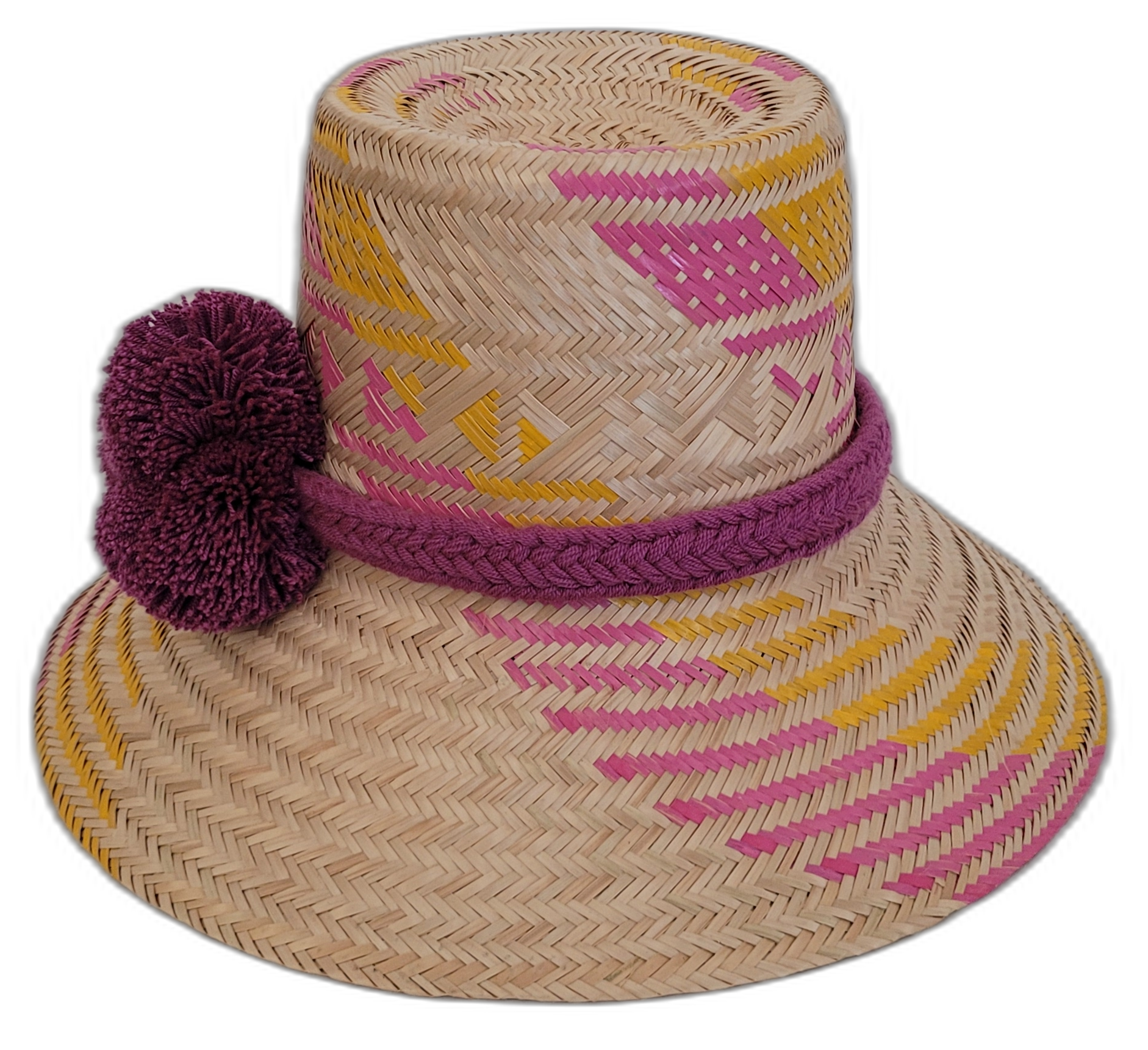 Colorful Boho straw hat, crafted from Iraca palm, featuring pink, yellow, and purple weave and handmade pompoms.