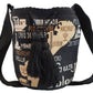 Boho-chick Wayuu bag showcasing woven names and map details in bold handcrafted style.