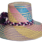 .Boho Wayuu hat with braided crown band and purple, black, and cream pompoms

