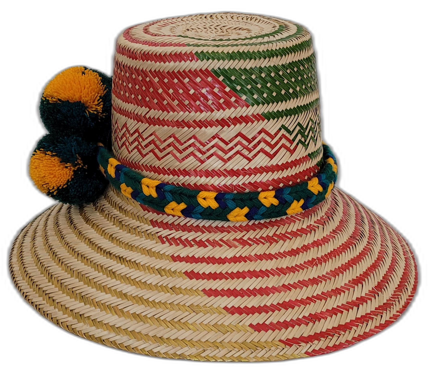 Boho chick straw hat featuring bold yellow and green pompom accents.Artisan Wayuu hat featuring geometric pattern and bright fluffy pompoms

