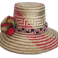 Artisan boho hat featuring tribal weave and tan, red, green pompoms
