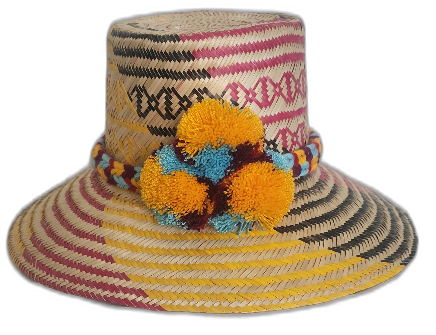 Handmade Wayuu straw hat with yellow, blue, and maroon pompoms