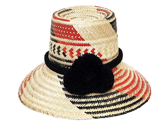 "Colorful Artisan Wayuu Hat handcrafted from iraca palm fibers, featuring vibrant designs and broad brim for sun protection."