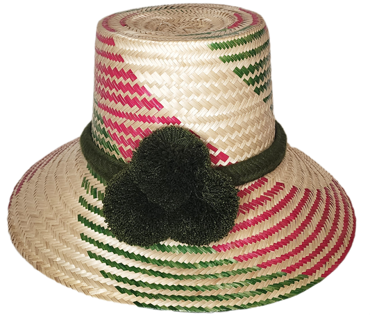 "Colorful artisan Wayuu hat with decorative pompoms, handwoven from Iraca palm, showcasing unique craftsmanship and cultural 