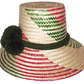 "Colorful artisan Wayuu hat with decorative pompoms, handwoven from Iraca palm, showcasing unique craftsmanship and cultural 