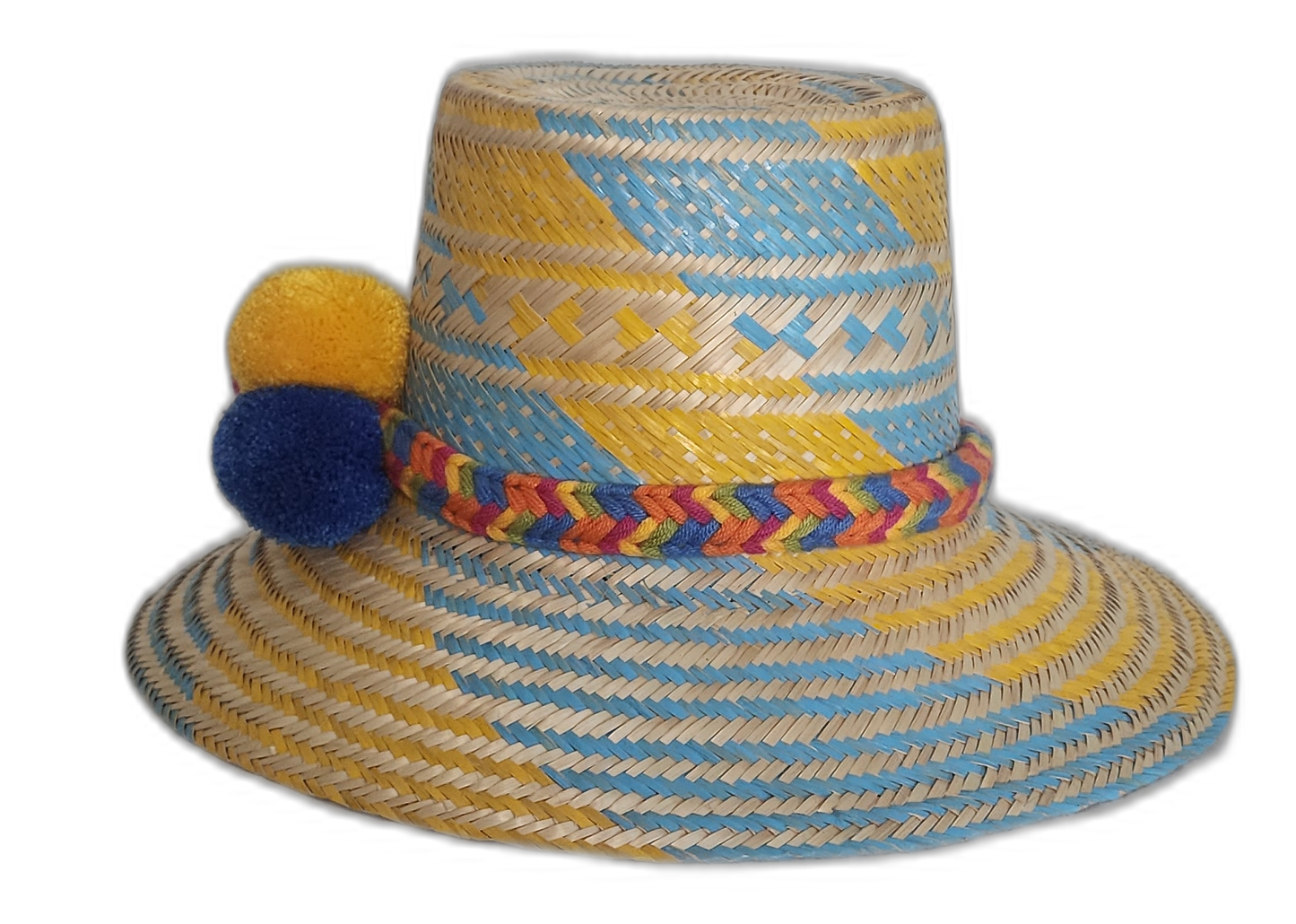 Boho chick straw hat crafted by Wayuu artisans, featuring bold geometric patterns and culturally symbolic pompoms.
