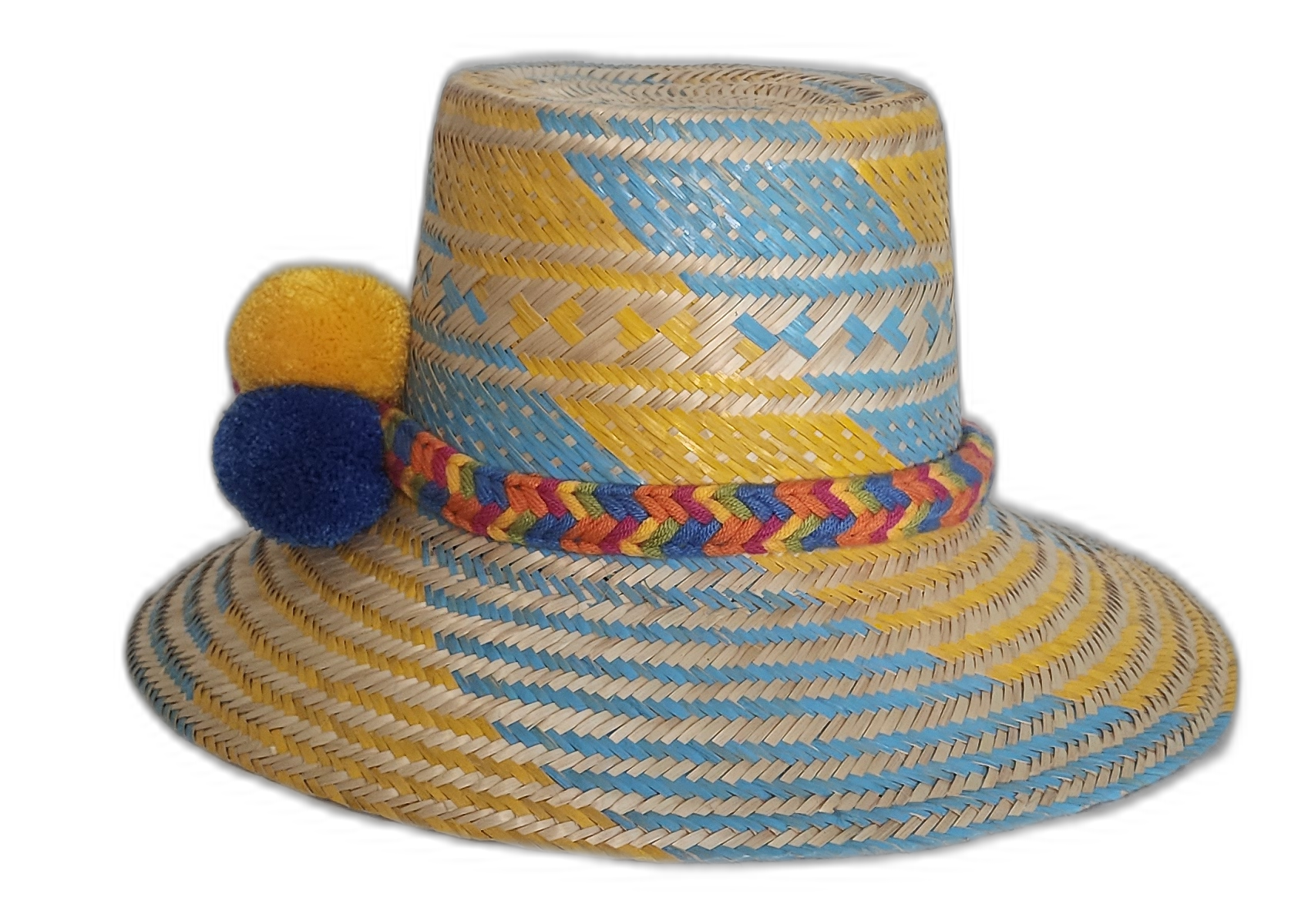 Boho chick straw hat crafted by Wayuu artisans, featuring bold geometric patterns and culturally symbolic pompoms.