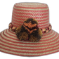 Colorful Boho Straw Hat handmade by Wayuu artisans with bold pompoms and chevron weave.Alexandra boho Wayuu hat with soft pink and beige zigzag pattern


