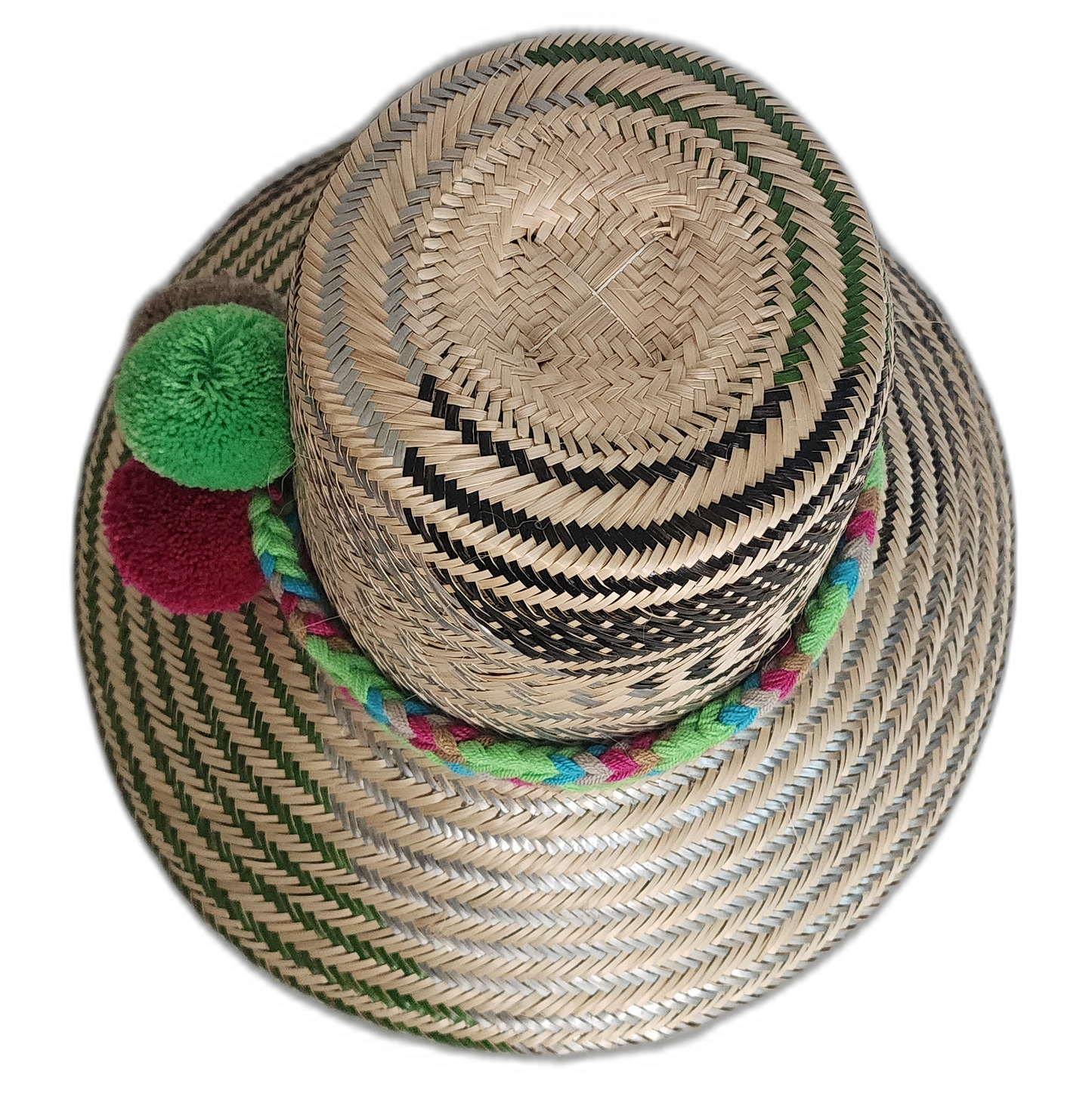 Artisanal Wayuu straw hat in natural tones, accented with bold colorful pompoms