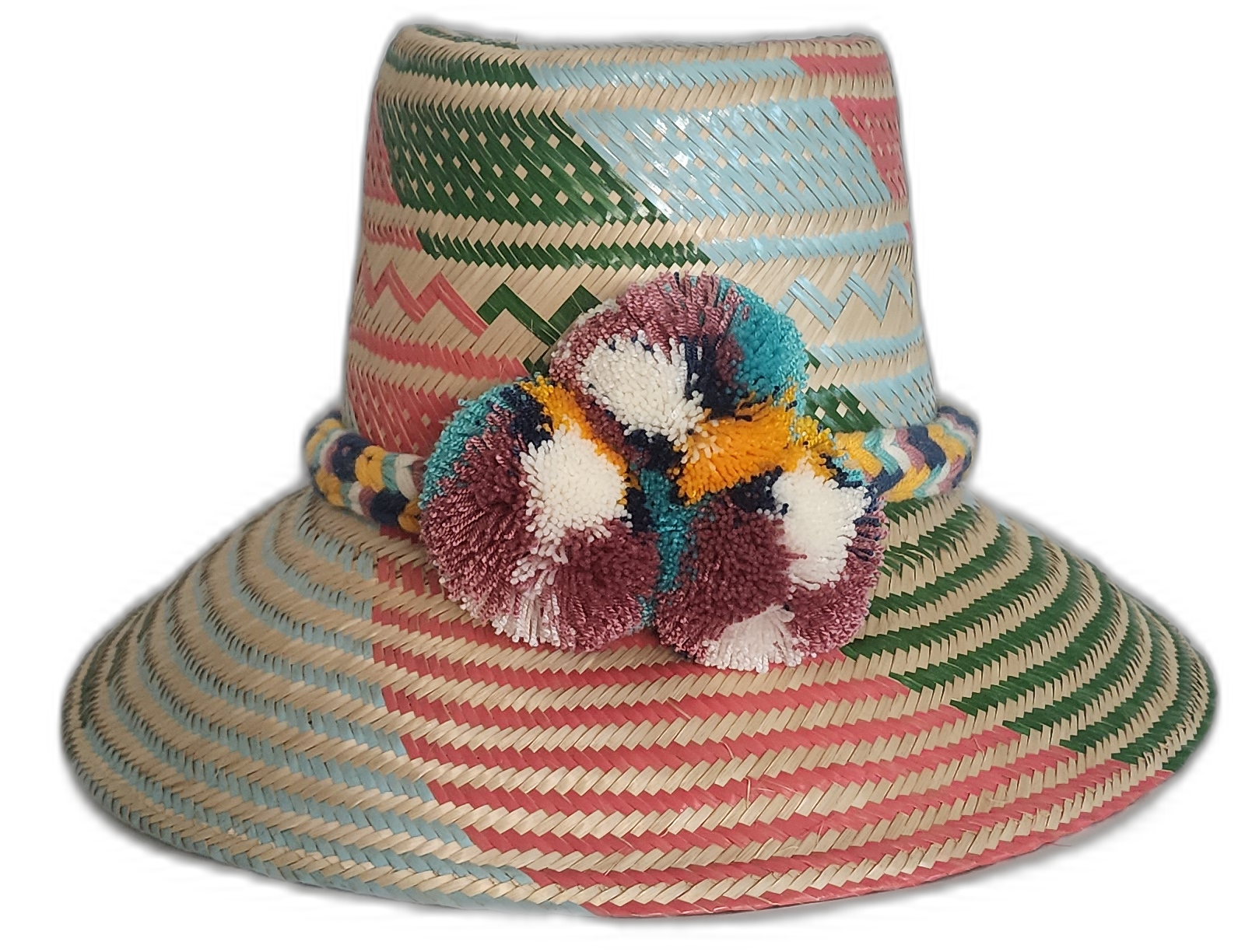 Handmade boho straw hat with vibrant pastel stripes and multicolor pompoms, crafted by Wayuu artisans.