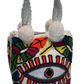 Handmade Wayuu punch needle bag with bright bohemian design