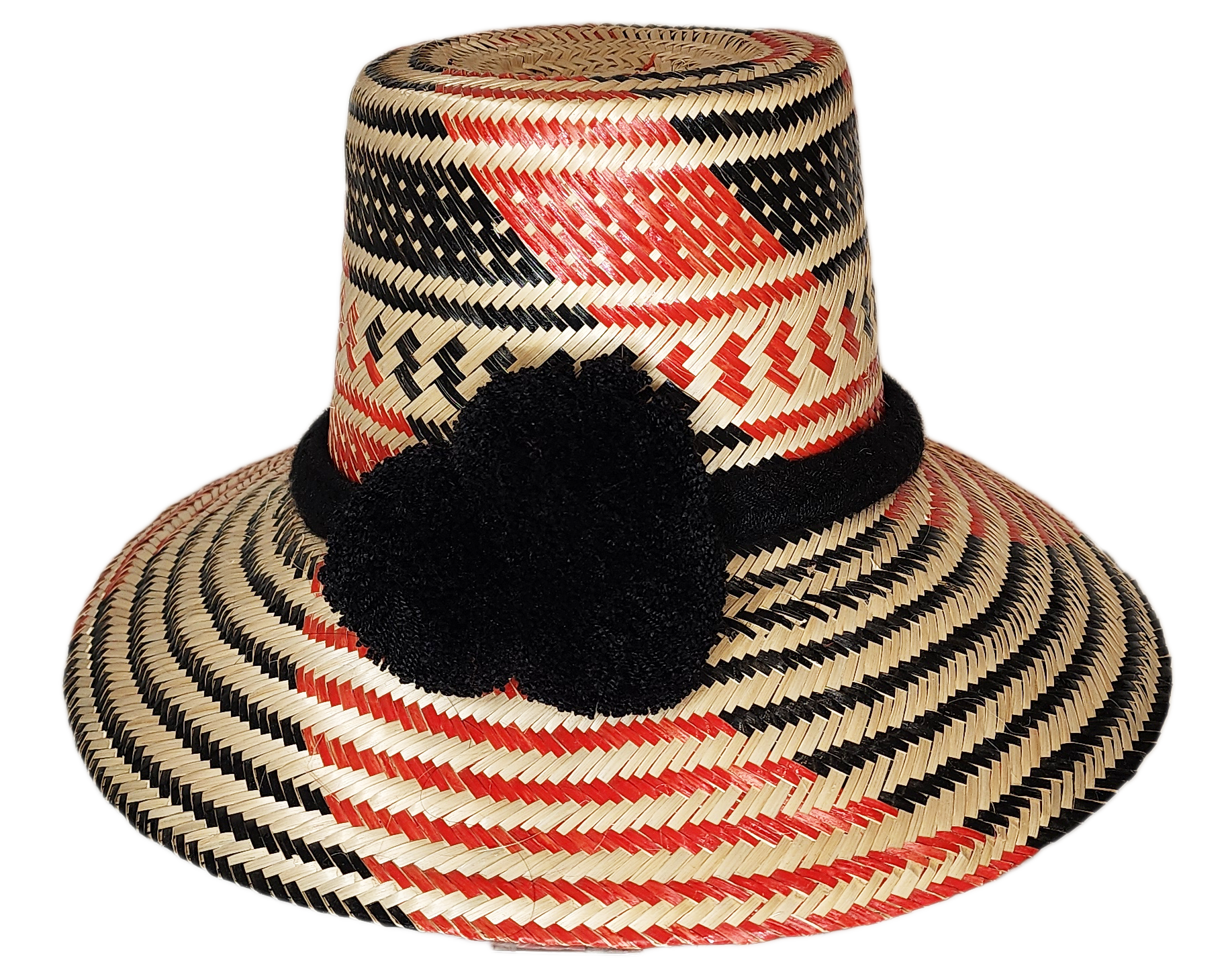 "Colorful handcrafted Artisan Wayuu hat adorned with meaningful pompoms, made from Iraca palm fibers by Wuitusu artisans."