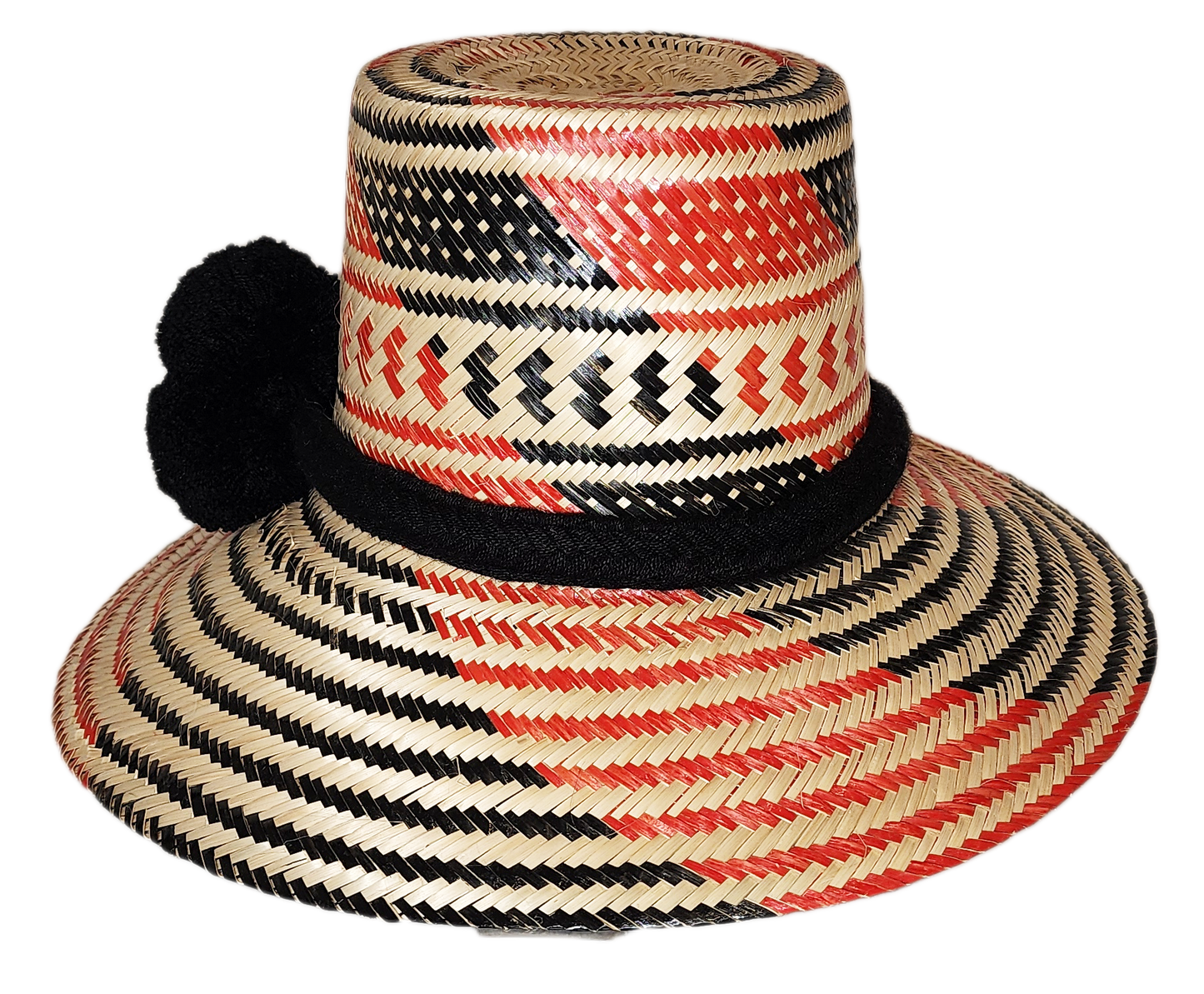"Colorful handcrafted Artisan Wayuu hat adorned with meaningful pompoms, made from Iraca palm fibers by Wuitusu artisans."