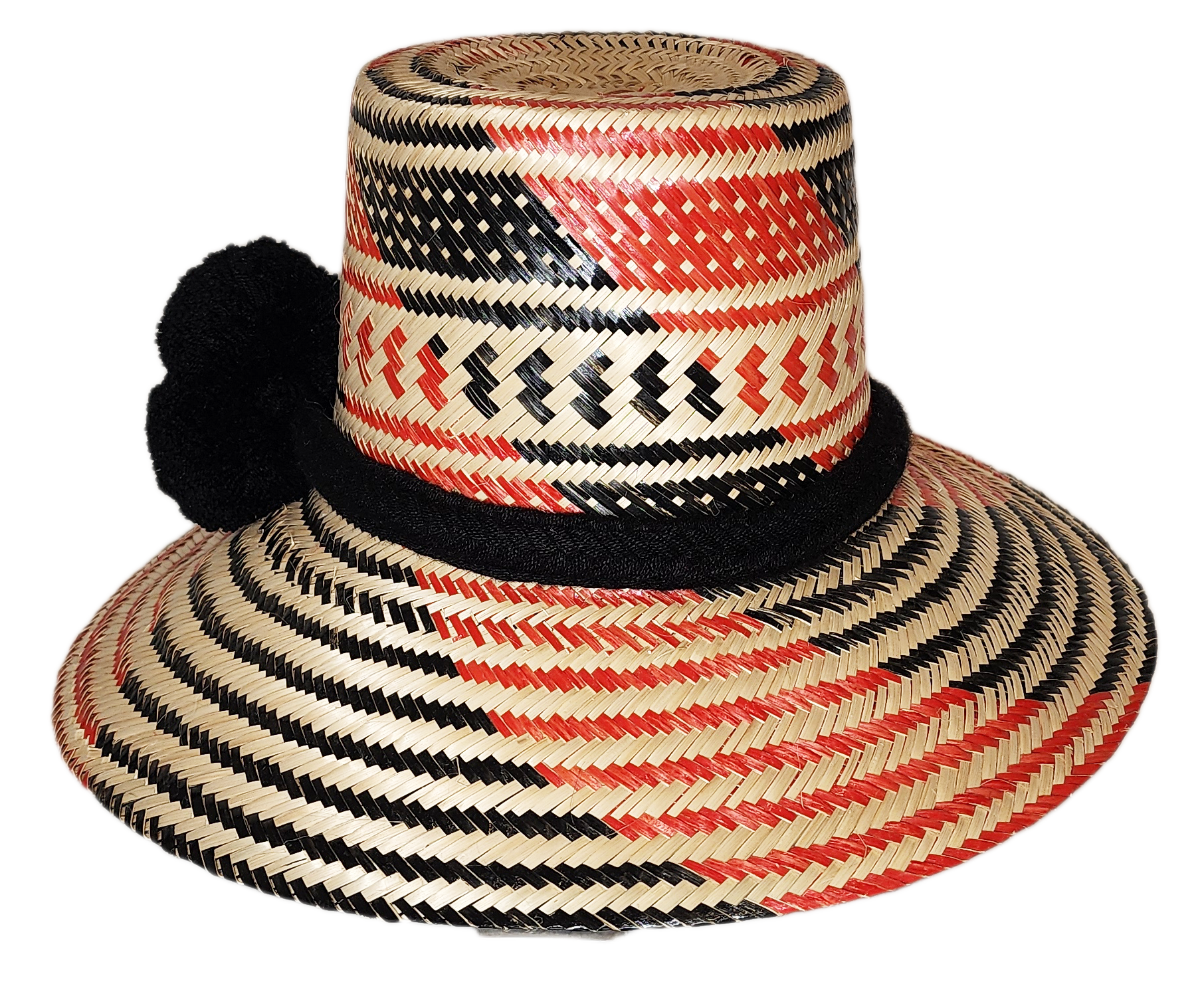 "Colorful handcrafted Artisan Wayuu hat adorned with meaningful pompoms, made from Iraca palm fibers by Wuitusu artisans."