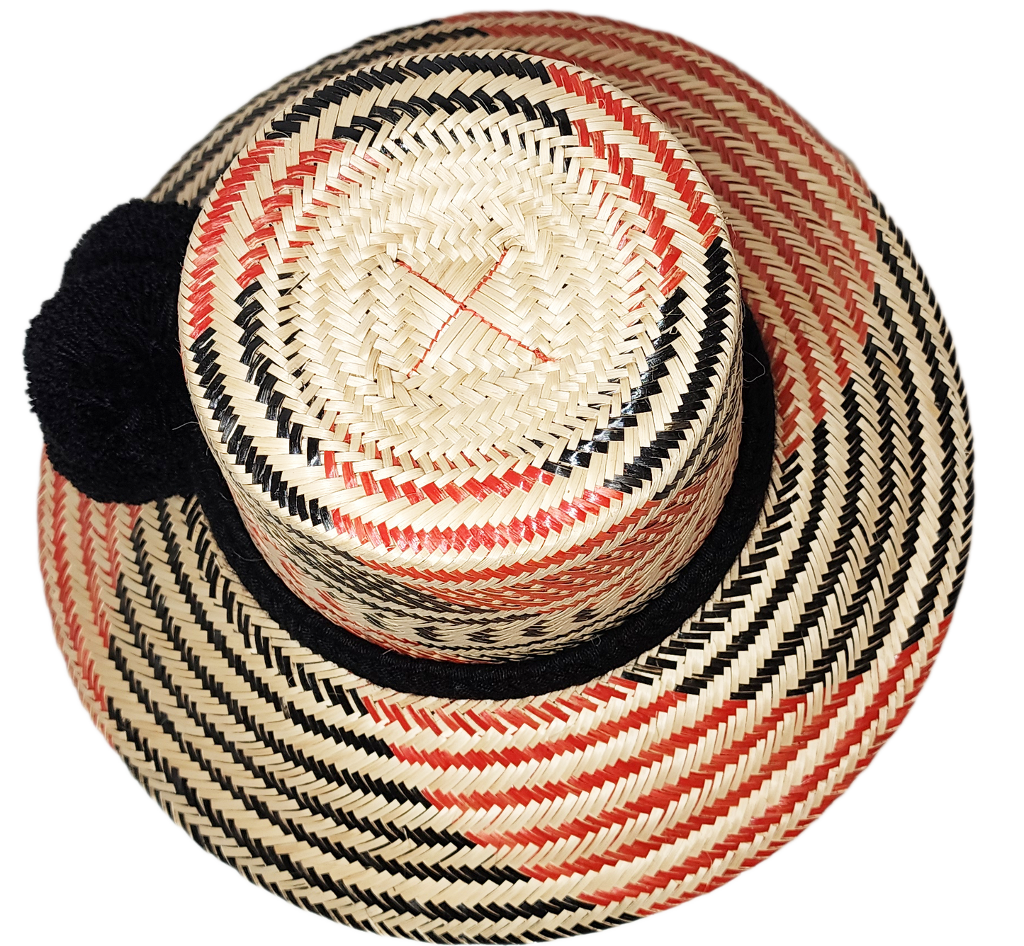 "Colorful handcrafted Artisan Wayuu hat adorned with meaningful pompoms, made from Iraca palm fibers by Wuitusu artisans."