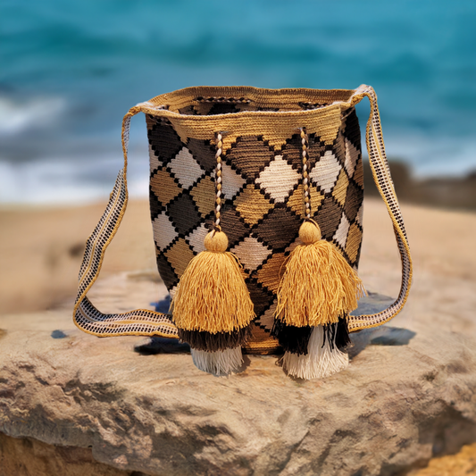 "Colorful handcrafted Paleteada Crochet Wayuu Bag by Wuitusu artisans, featuring intricate geometric patterns and a durable s