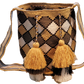 "Colorful handcrafted Paleteada Crochet Wayuu Bag by Wuitusu artisans, featuring intricate geometric patterns and a durable s