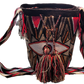 "Colorful handcrafted Wayuu crochet bag with unique geometric patterns, crafted by indigenous artisans, suitable for versatil