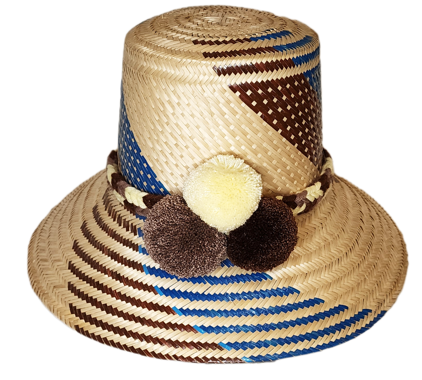 "Colorful, handcrafted Wayuu hat from Wuitusu, adorned with cultural pompoms, made from Iraca palm fibers."