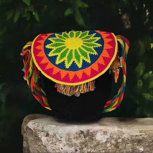 "Colorful handcrafted Wayuu mochila bag with lid, showcasing traditional crochet patterns and bohemian flair."