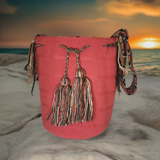 "Colorful handcrafted Wuitusu crochet bag showcasing vibrant Wayuu patterns and adjustable straps."