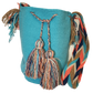 "Colorful handcrafted Wuitusu crochet bags by Wayuu women, featuring vibrant patterns and ethical fair trade practices."