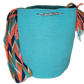 "Colorful handcrafted Wuitusu crochet bags by Wayuu women, featuring vibrant patterns and ethical fair trade practices."