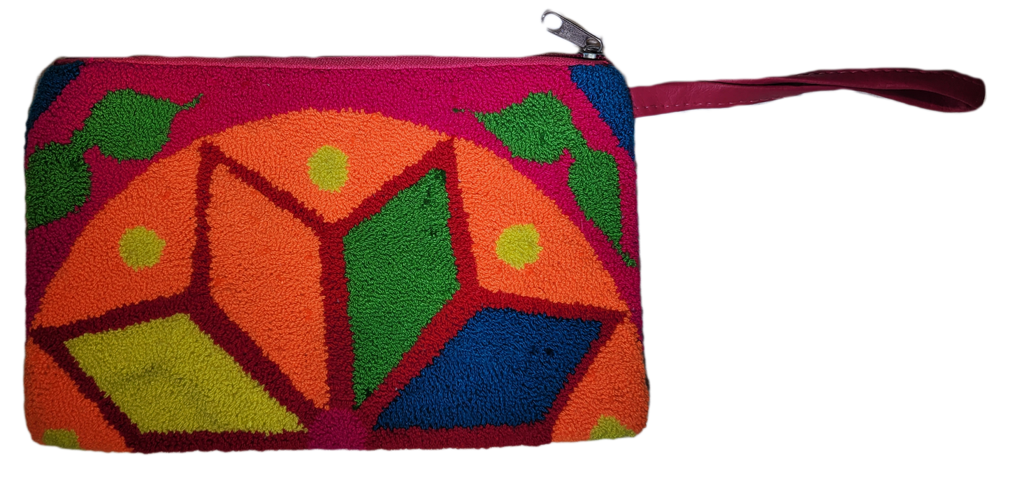 "Colorful handcrafted Wuitusu Needle Punch Clutch with vibrant patterns and a secure zippered closure, supporting Wayuu artis